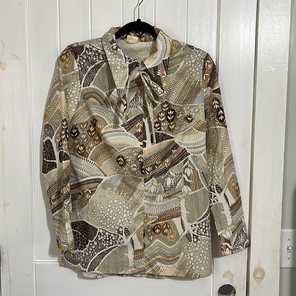 Vintage 70’s JCPenney 1/4 zip top with removable tie at neck.Size small/medium.